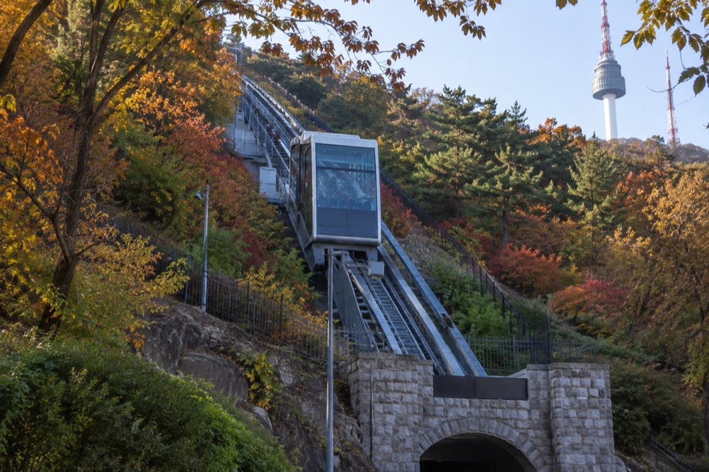 The Namsan Ormi inclined elevator rising along the hillside toward the cable car station