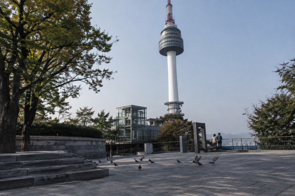 Summit plaza of Namsan with N Seoul Tower rising above the terraces and walkways
