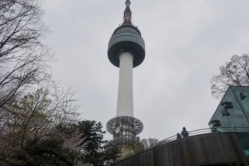 The tower mast and body seen from below against the sky