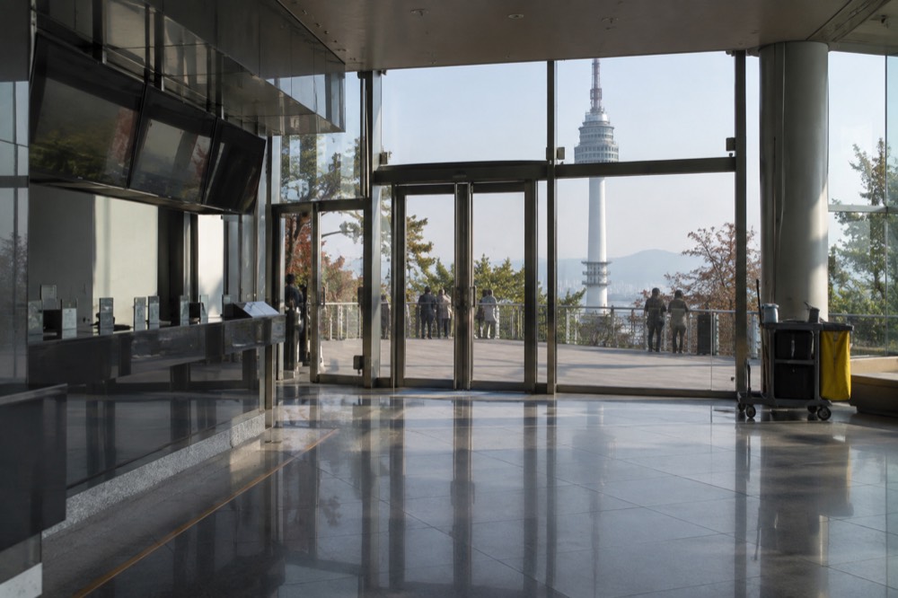 The N Seoul Tower observatory entrance on Plaza 5F with the ticket desk and glass doors ahead